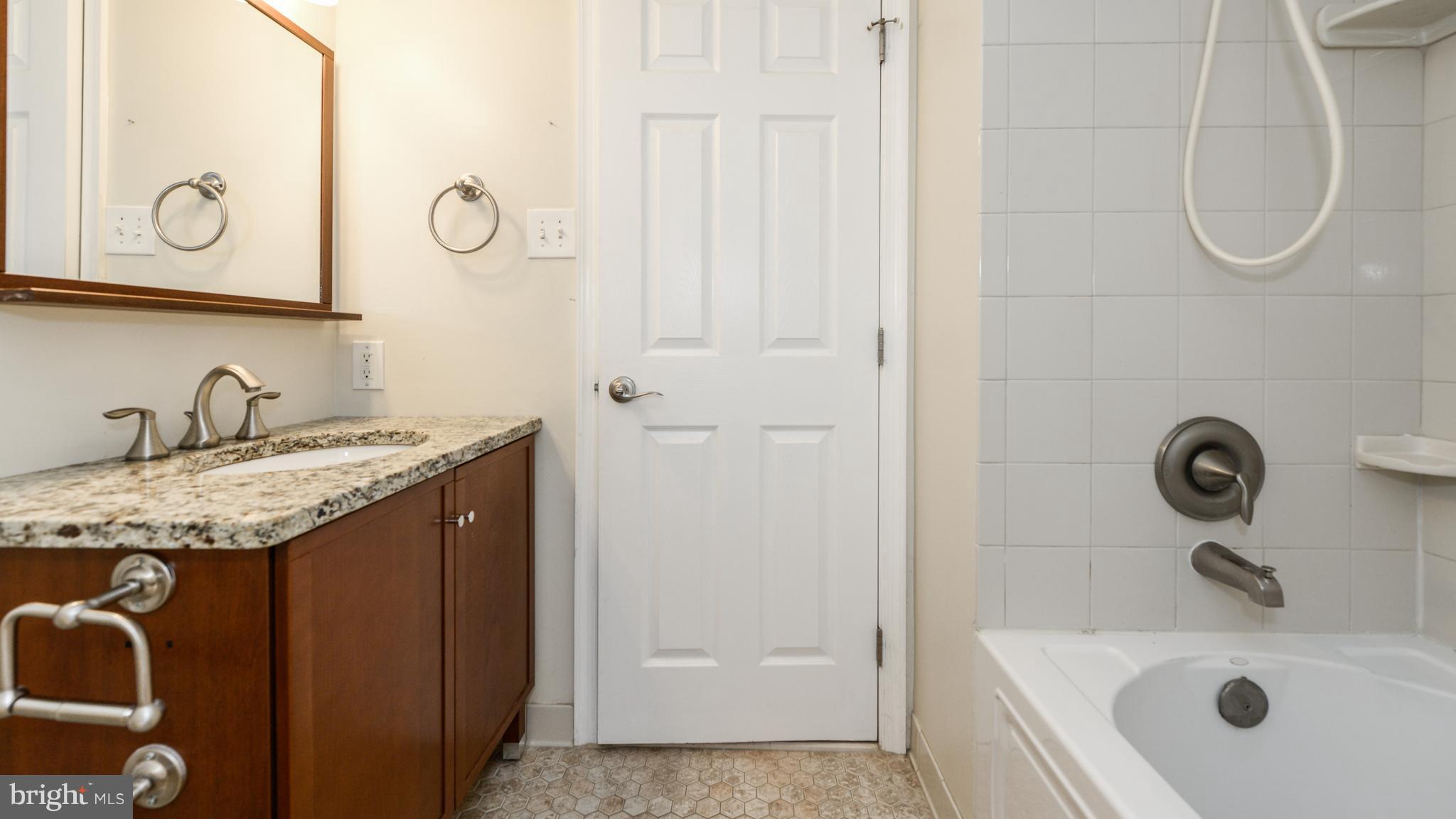 1414 Northgate Square, Unit 12B Reston, VA 20190 - Photo 12 of 30 Updated Hall Bath
