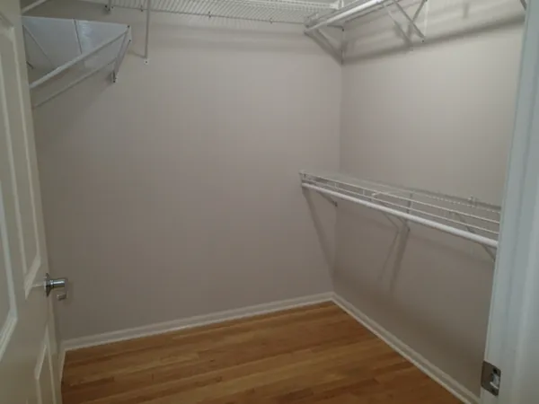 a view of a room with racks on the wall
