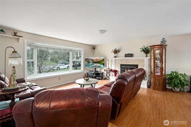 a view of a dining room with furniture window and outside view