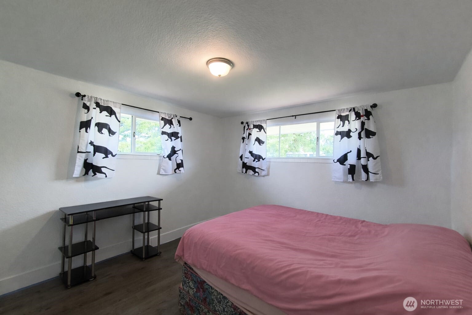 108 West Bartlett Road Lynden, WA 98264 - Photo 15 of 24 a bedroom with a bed and a desk