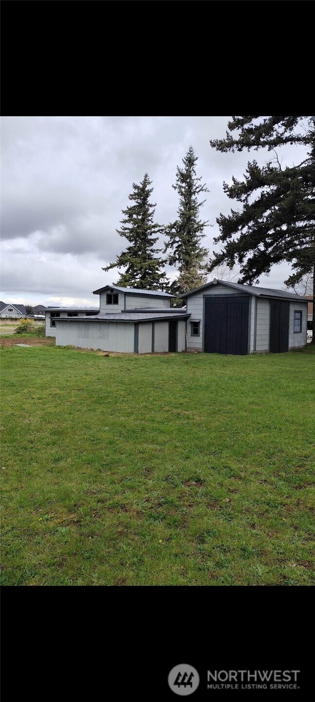 108 West Bartlett Road Lynden, WA 98264 - Photo 24 of 24 a view of a large pool with lawn chairs