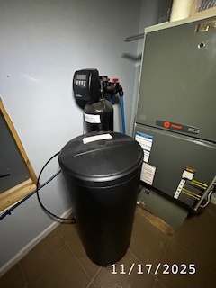 410 South Ralph Street Watseka, IL 60970 - Photo 16 of 18 a picture of water heater room