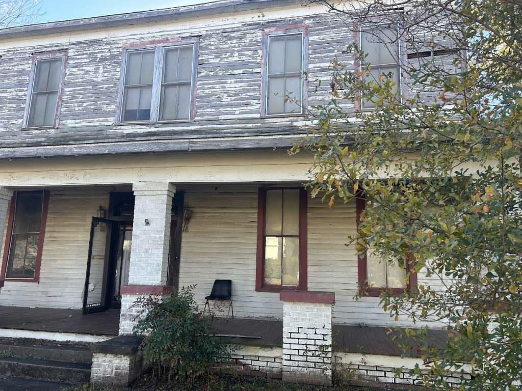 500 East Austin Street Marshall, TX 75670 - Photo 2 of 3 a front view of a house with garden
