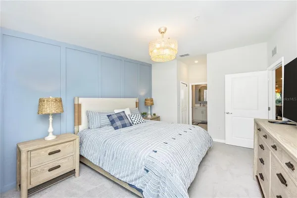 a view of a livingroom with workspace and a couch