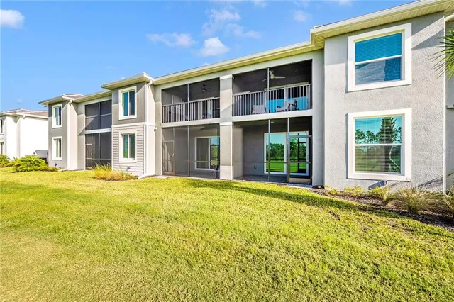 a view of a patio with a table and chairs