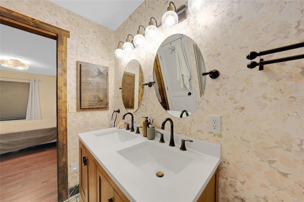 7597 Highway 31 Arcadia, FL 34266 - Photo 15 of 45 a bathroom with a sink and a mirror