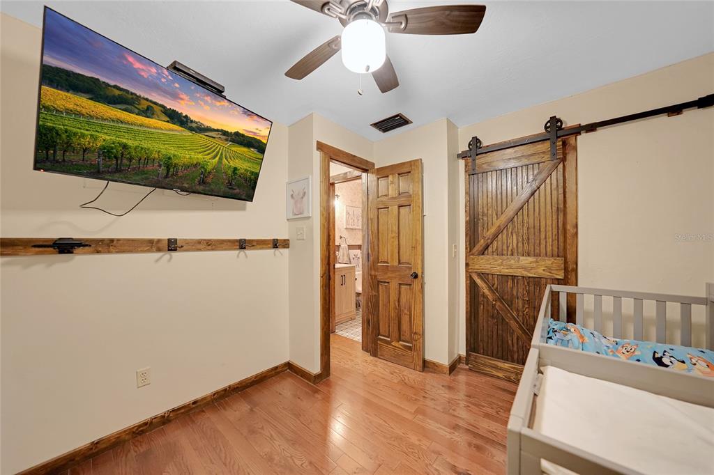 7597 Highway 31 Arcadia, FL 34266 - Photo 18 of 45 a view of a room with wooden floor and windows