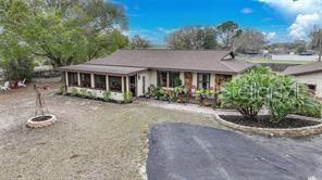 7597 Highway 31 Arcadia, FL 34266 - Photo 2 of 45 a front view of a house with a yard