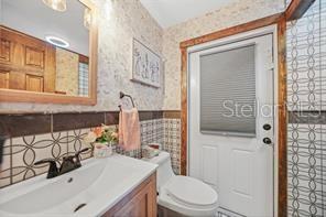 7597 Highway 31 Arcadia, FL 34266 - Photo 22 of 45 a bathroom with a sink a toilet and shower
