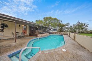 7597 Highway 31 Arcadia, FL 34266 - Photo 28 of 45 a view of a swimming pool with a patio