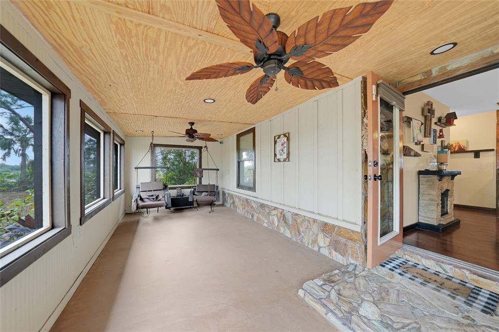 7597 Highway 31 Arcadia, FL 34266 - Photo 30 of 45 a view of a livingroom with furniture and a ceiling fan