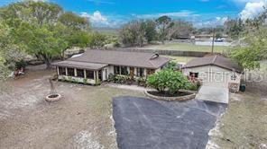 7597 Highway 31 Arcadia, FL 34266 - Photo 45 of 45 a view of a house with a yard and a garden