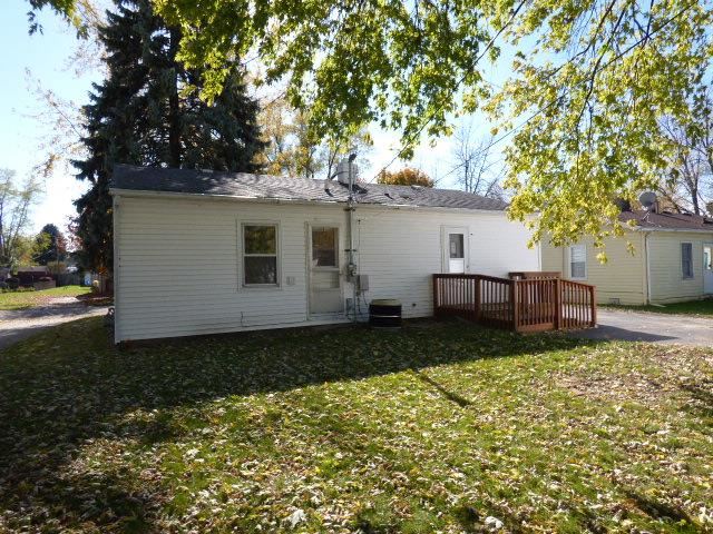517 Spring Avenue DeKalb, IL 60115 - Photo 3 of 11 a view of a house with a yard