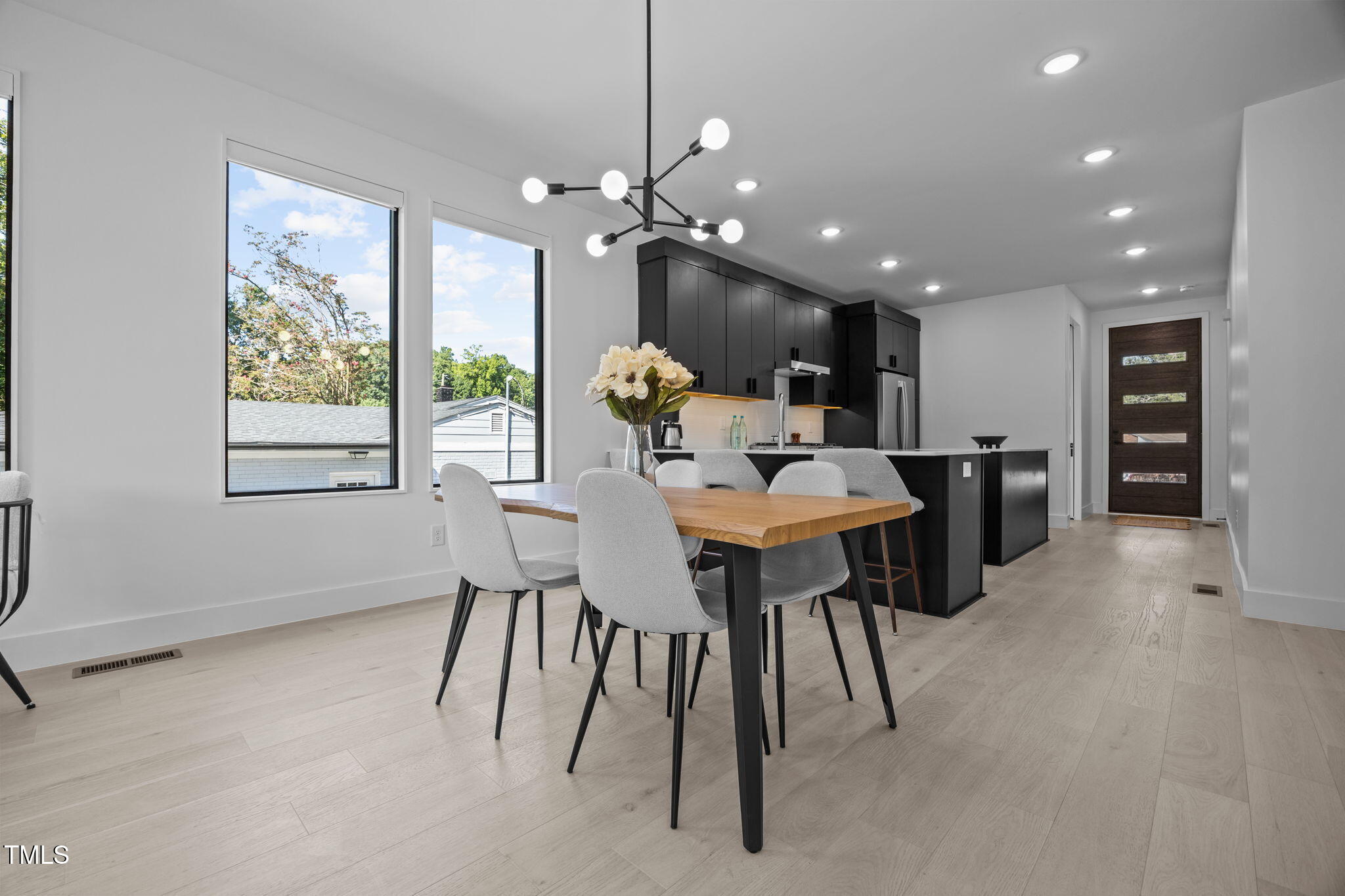808 Culpepper Lane Raleigh, NC 27610 - Photo 11 of 27 a view of a dining room with furniture window and outside view