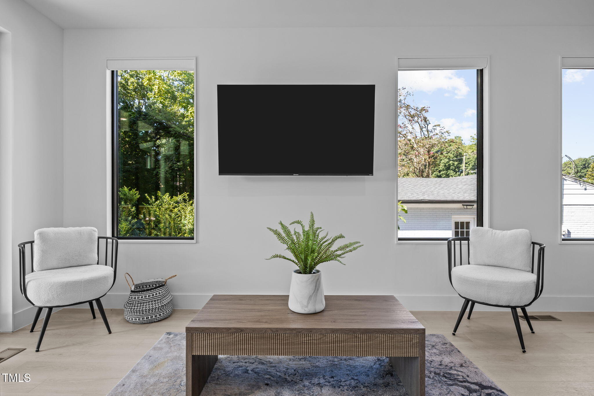 808 Culpepper Lane Raleigh, NC 27610 - Photo 13 of 27 a living room with furniture and a potted plant