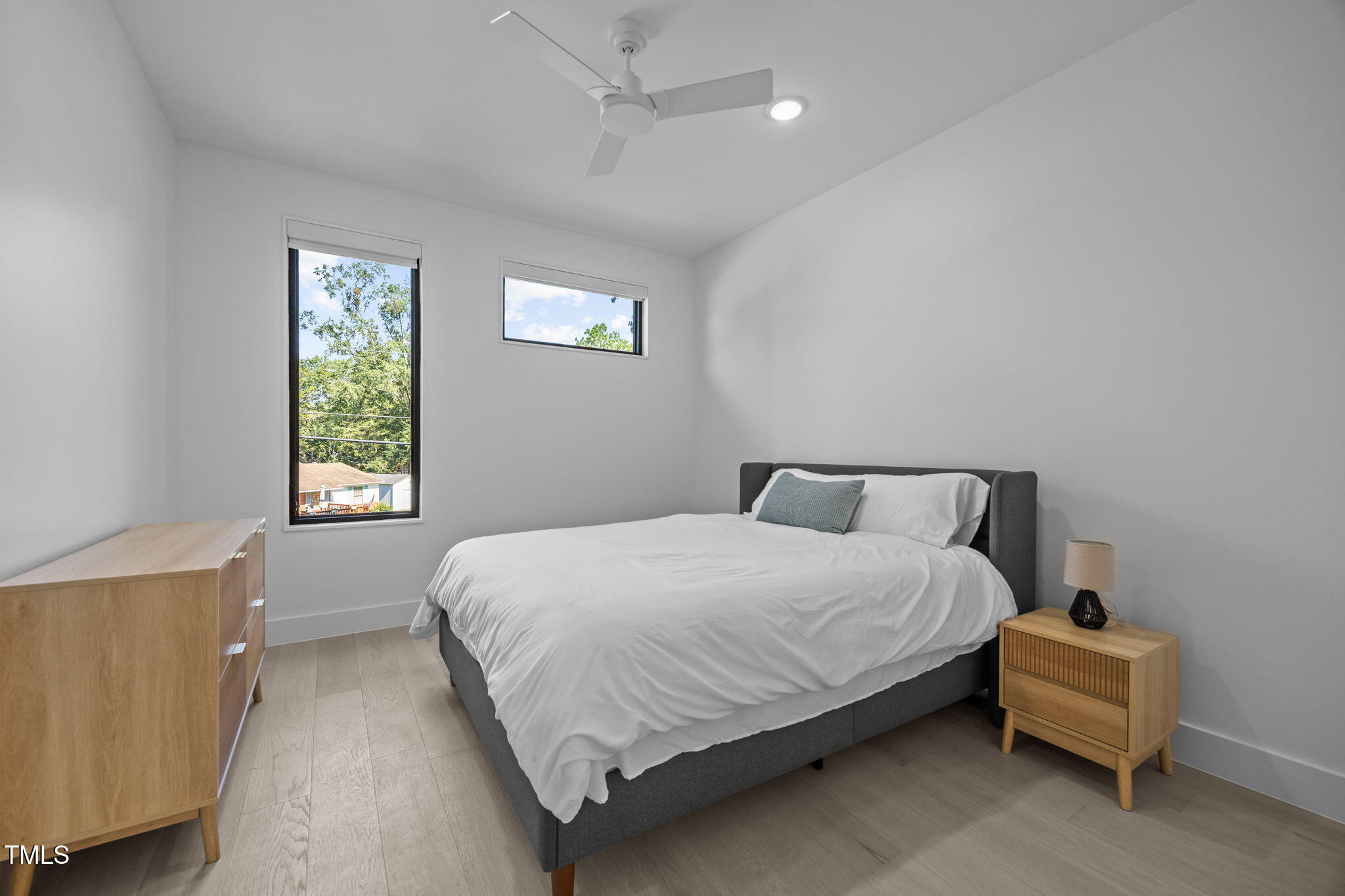808 Culpepper Lane Raleigh, NC 27610 - Photo 20 of 27 a bedroom with a bed and a window