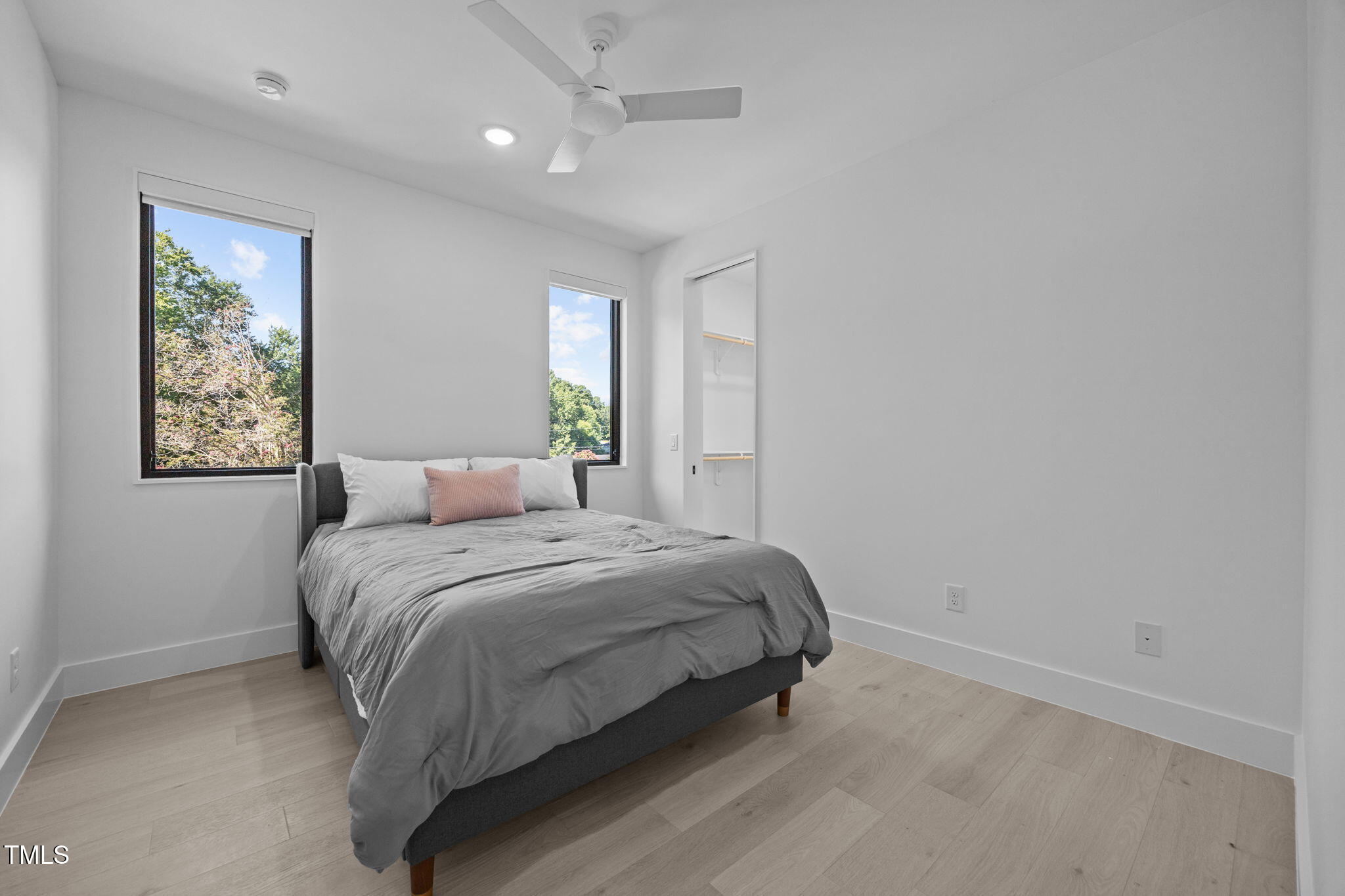 808 Culpepper Lane Raleigh, NC 27610 - Photo 22 of 27 a bedroom with a bed and a window