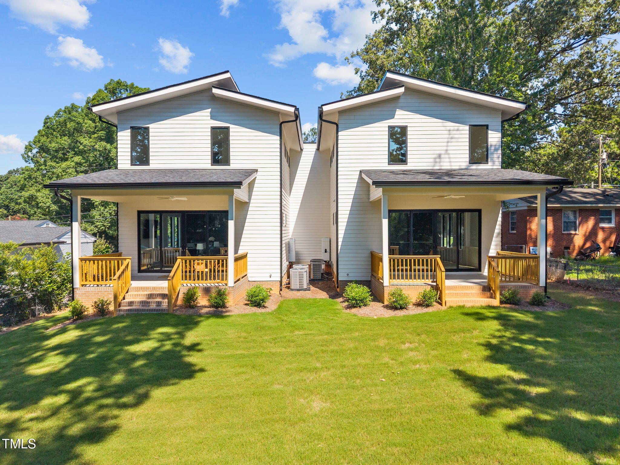 808 Culpepper Lane Raleigh, NC 27610 - Photo 25 of 27 a front view of a house with a yard and porch
