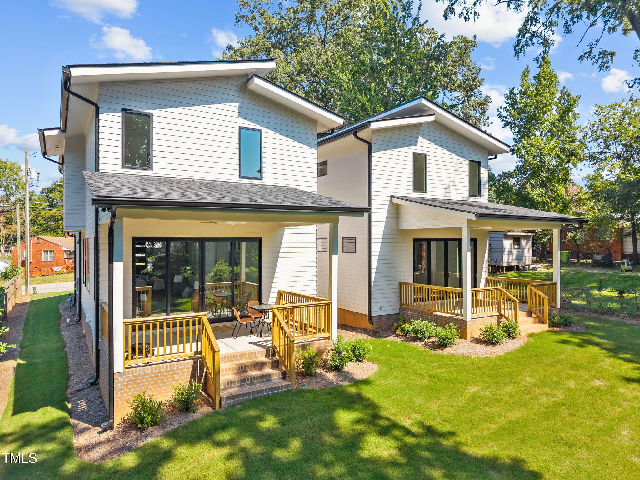 808 Culpepper Lane Raleigh, NC 27610 - Photo 26 of 27 a view of a house with a yard patio and a slide