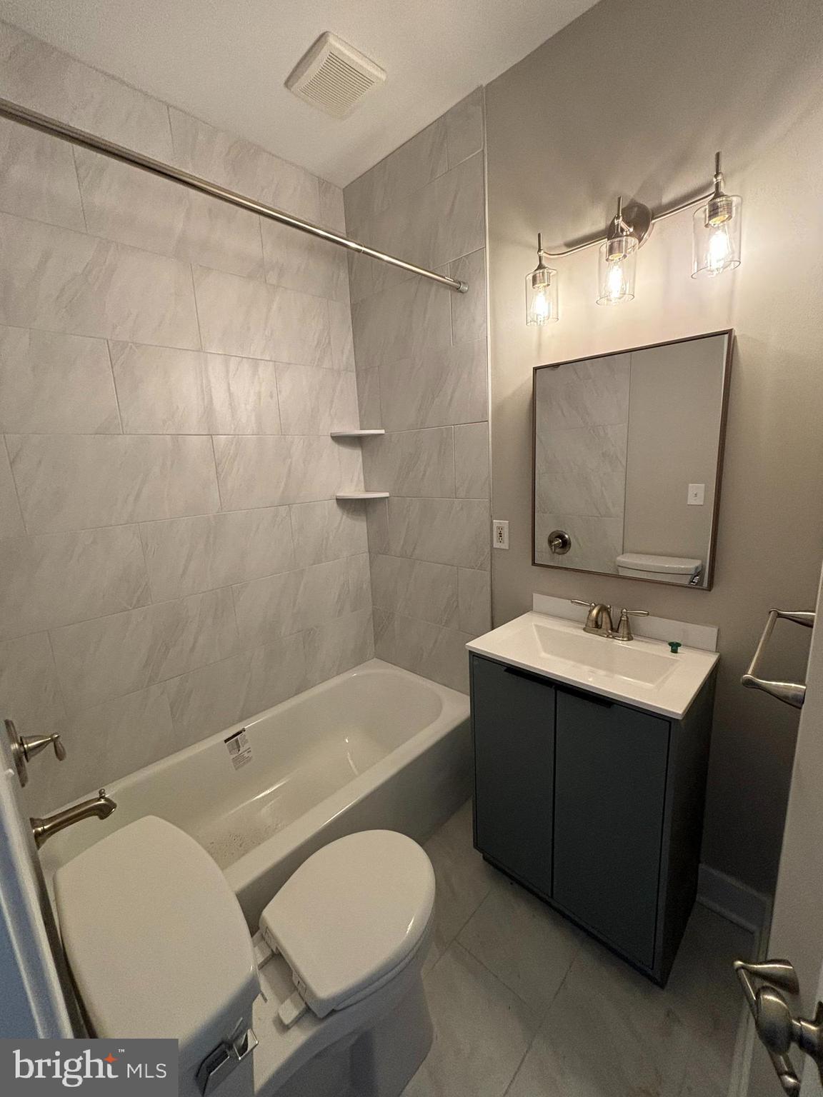 18 West 5th Street, Unit A/B Media, PA 19063 - Photo 6 of 12 a bathroom with a sink toilet tub and shower
