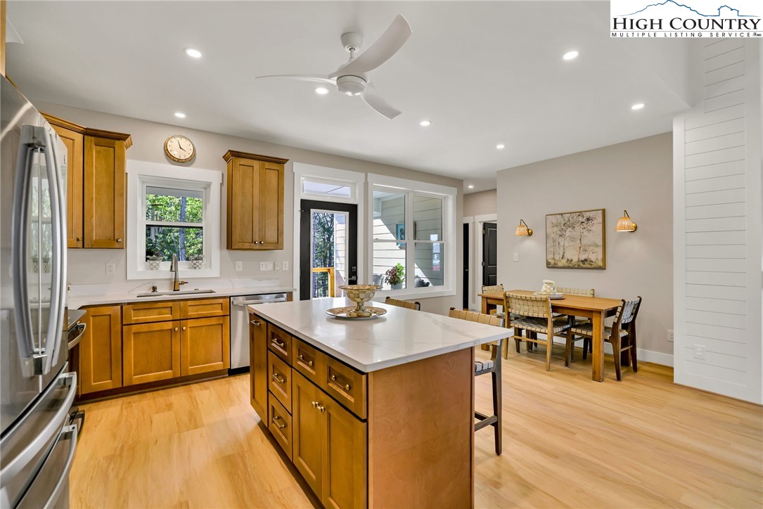 379 Turtle Rdg Road Sparta, NC 28675 - Photo 18 of 43 a large kitchen with kitchen island a large island in it