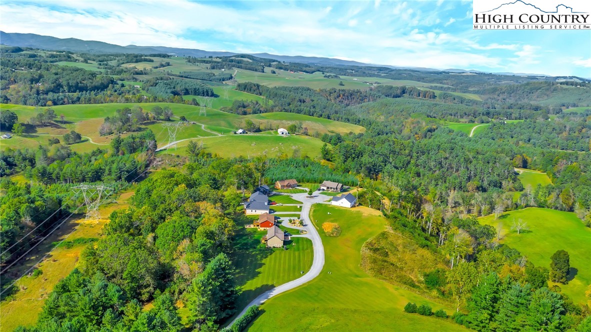 379 Turtle Rdg Road Sparta, NC 28675 - Photo 26 of 43 a view of a city with lush green forest