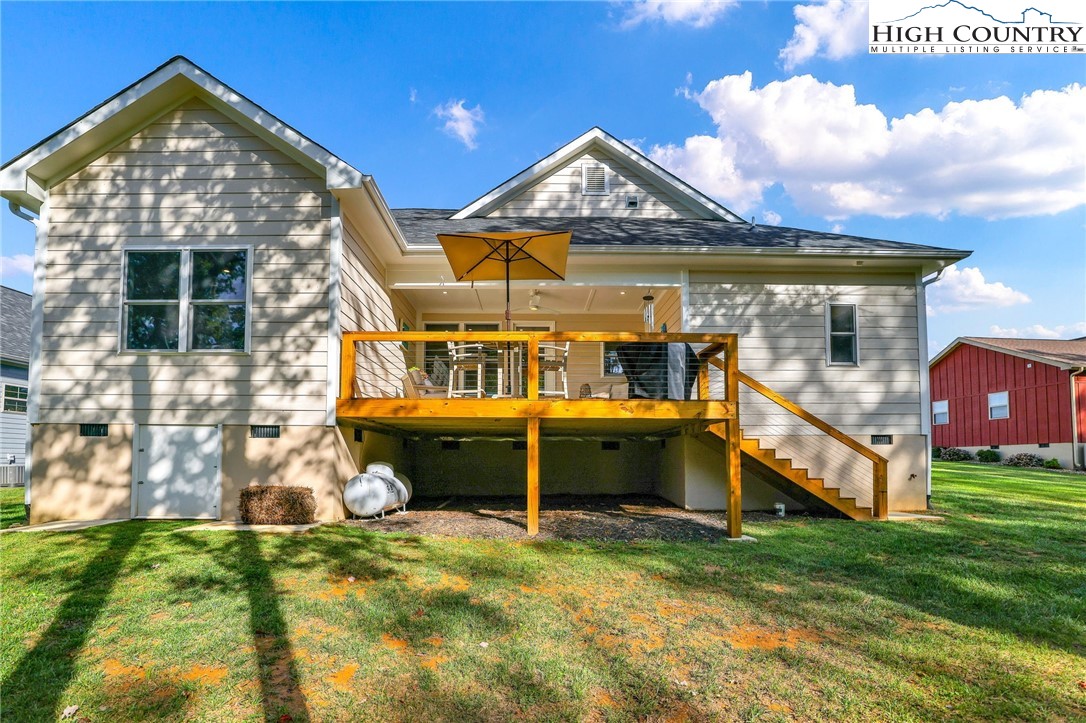 379 Turtle Rdg Road Sparta, NC 28675 - Photo 3 of 43 a front view of a house with a yard