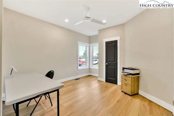 a en suite bathroom with a sink and a mirror