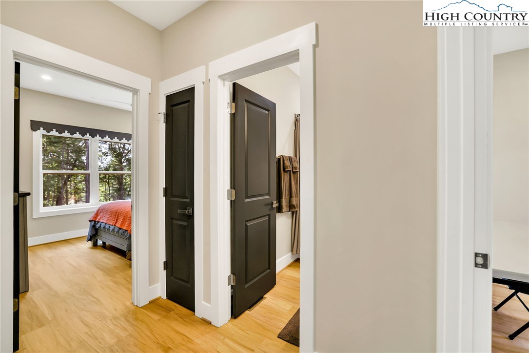 379 Turtle Rdg Road Sparta, NC 28675 - Photo 41 of 43 a en suite bathroom with a sink and a mirror