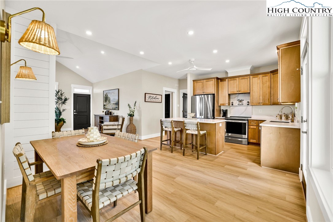 379 Turtle Rdg Road Sparta, NC 28675 - Photo 42 of 43 a view of a dining room with furniture and wooden floor