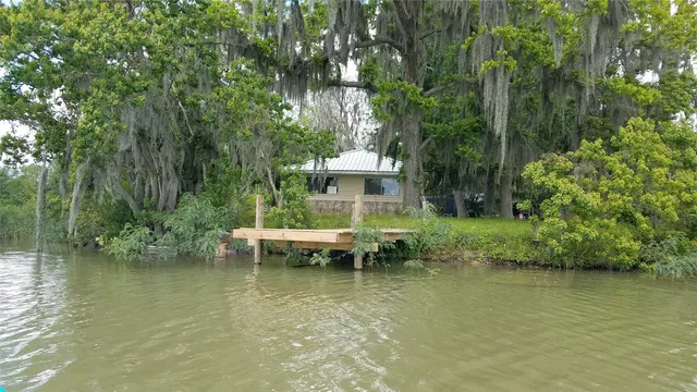 a view of a lake from a yard