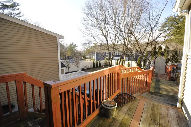 a view of a balcony with chairs