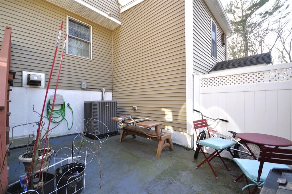 413 Harvard Street Whitman, MA 02382 - Photo 33 of 42 a building outdoor space with patio furniture