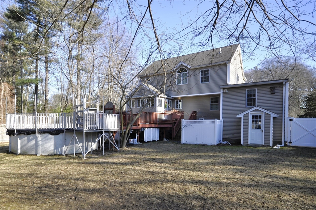 413 Harvard Street Whitman, MA 02382 - Photo 36 of 42 a front view of a house with a yard