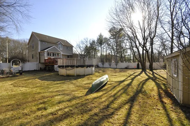 a view of swimming pool with outdoor seating