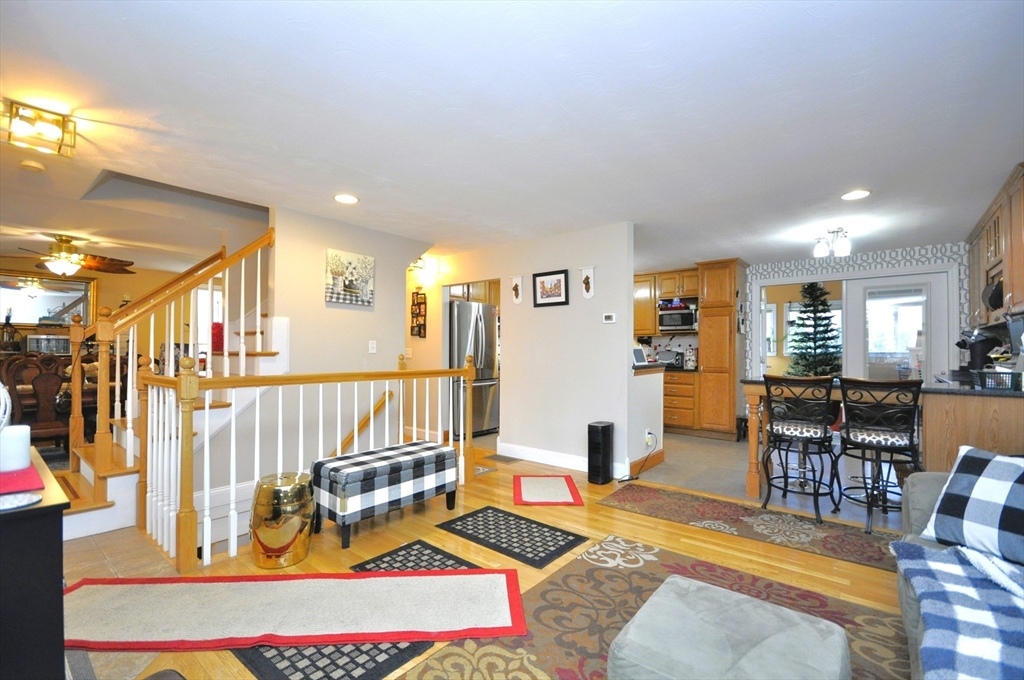 413 Harvard Street Whitman, MA 02382 - Photo 5 of 42 a living room with furniture and a table