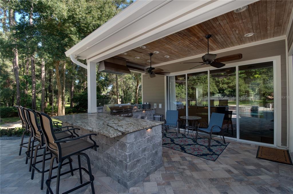 1219 Southwest 63rd Street Road Ocala, FL 34476 - Photo 15 of 72 a view of an outdoor space with seating