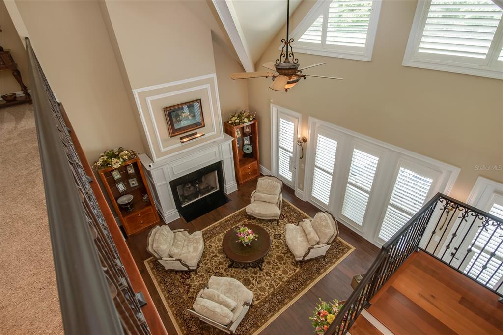 1219 Southwest 63rd Street Road Ocala, FL 34476 - Photo 43 of 72 a living room with furniture and a fireplace