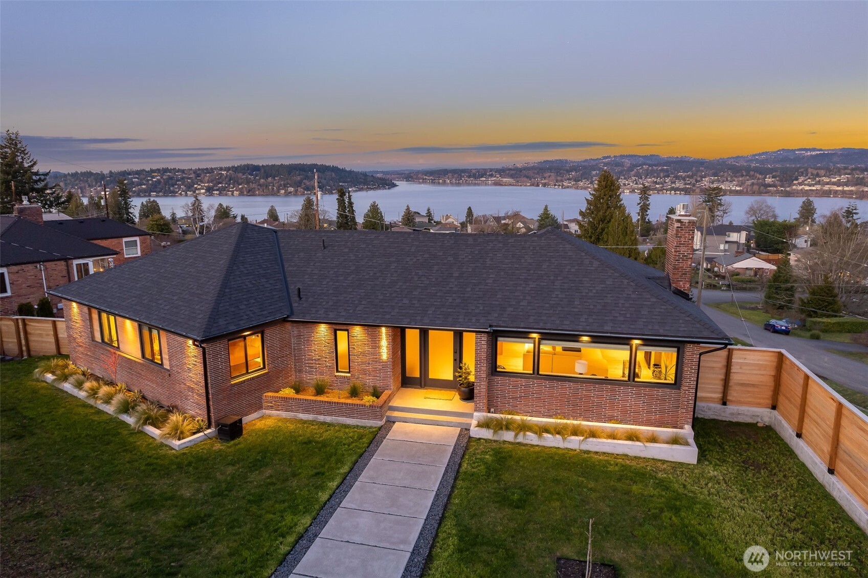 an aerial view of an house with swimming pool yard and outdoor seating