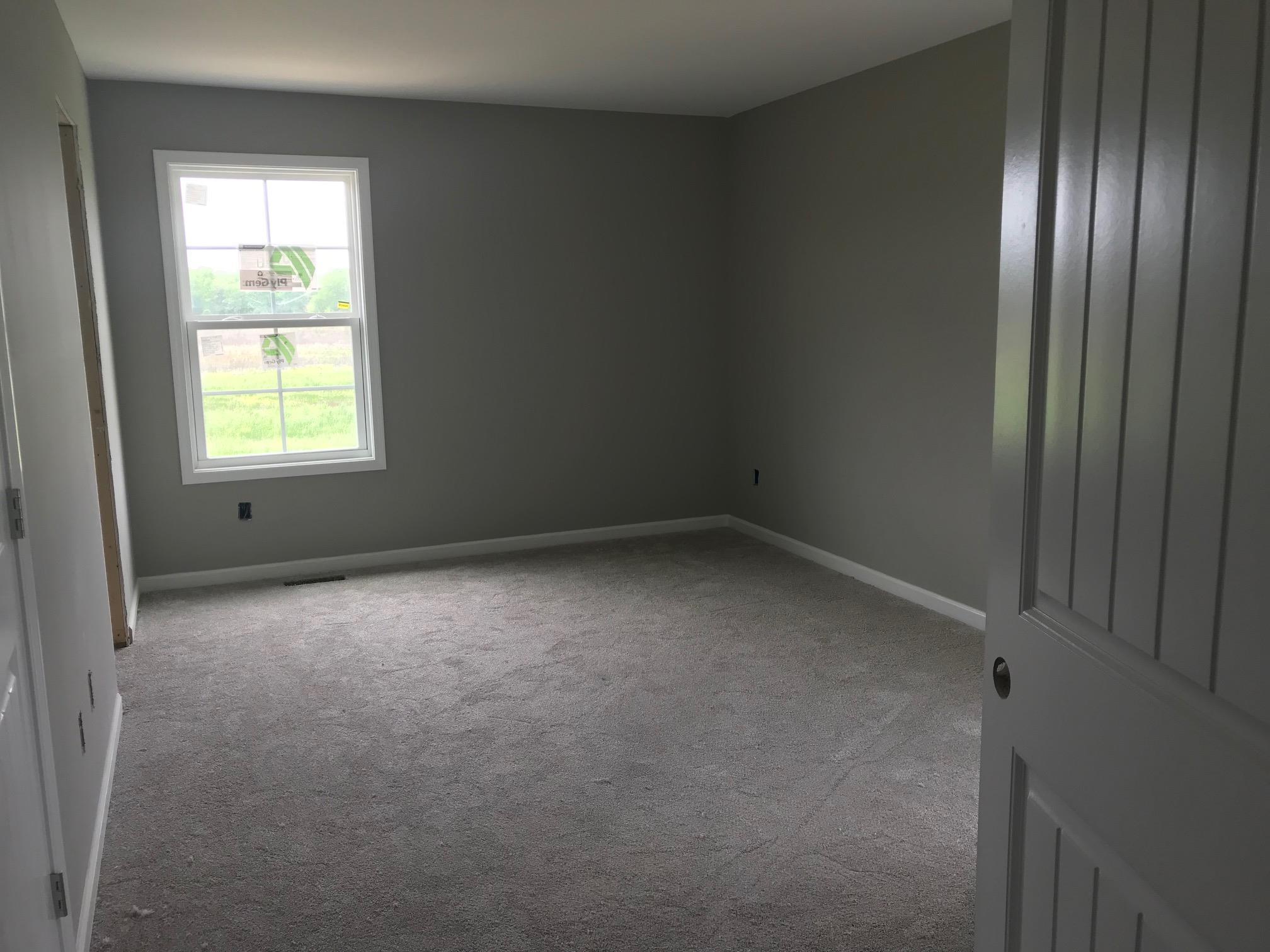 1022 Gil Hodges Road Portland, TN 37148 - Photo 8 of 9 an empty room with windows
