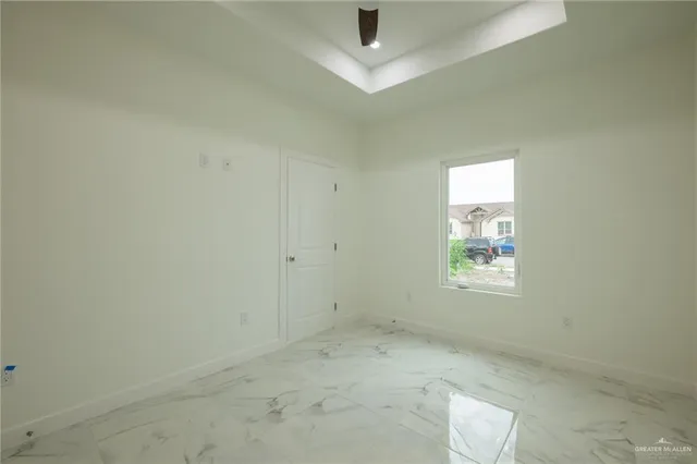 an empty room with windows