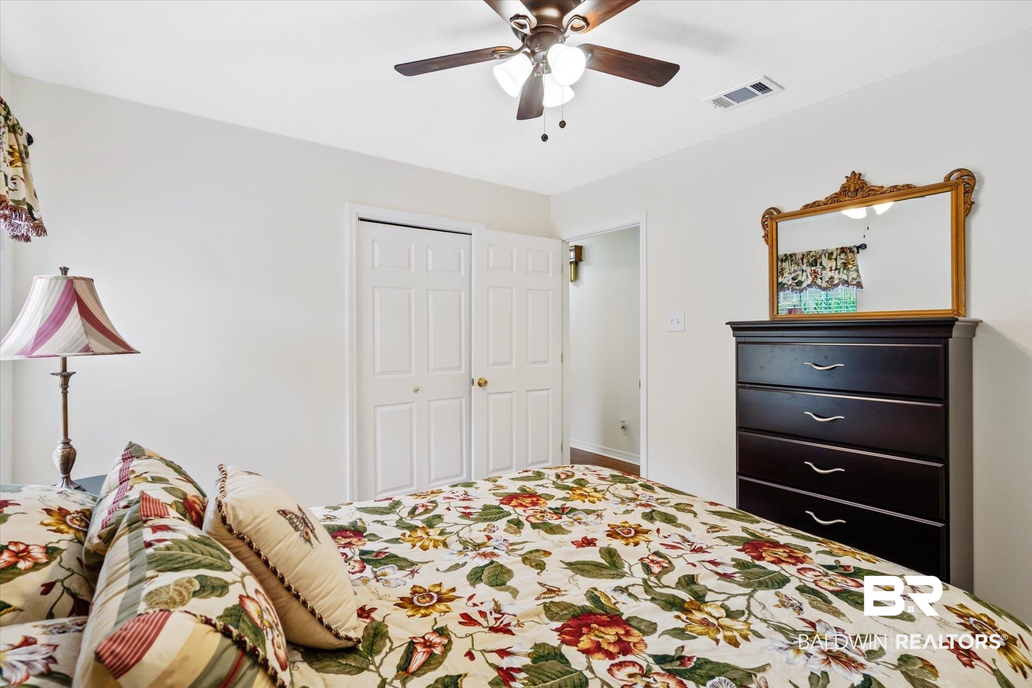 7236 Highpointe Place East Daphne, AL 36527 - Photo 23 of 32 Bedroom featuring ceiling fan and a closet