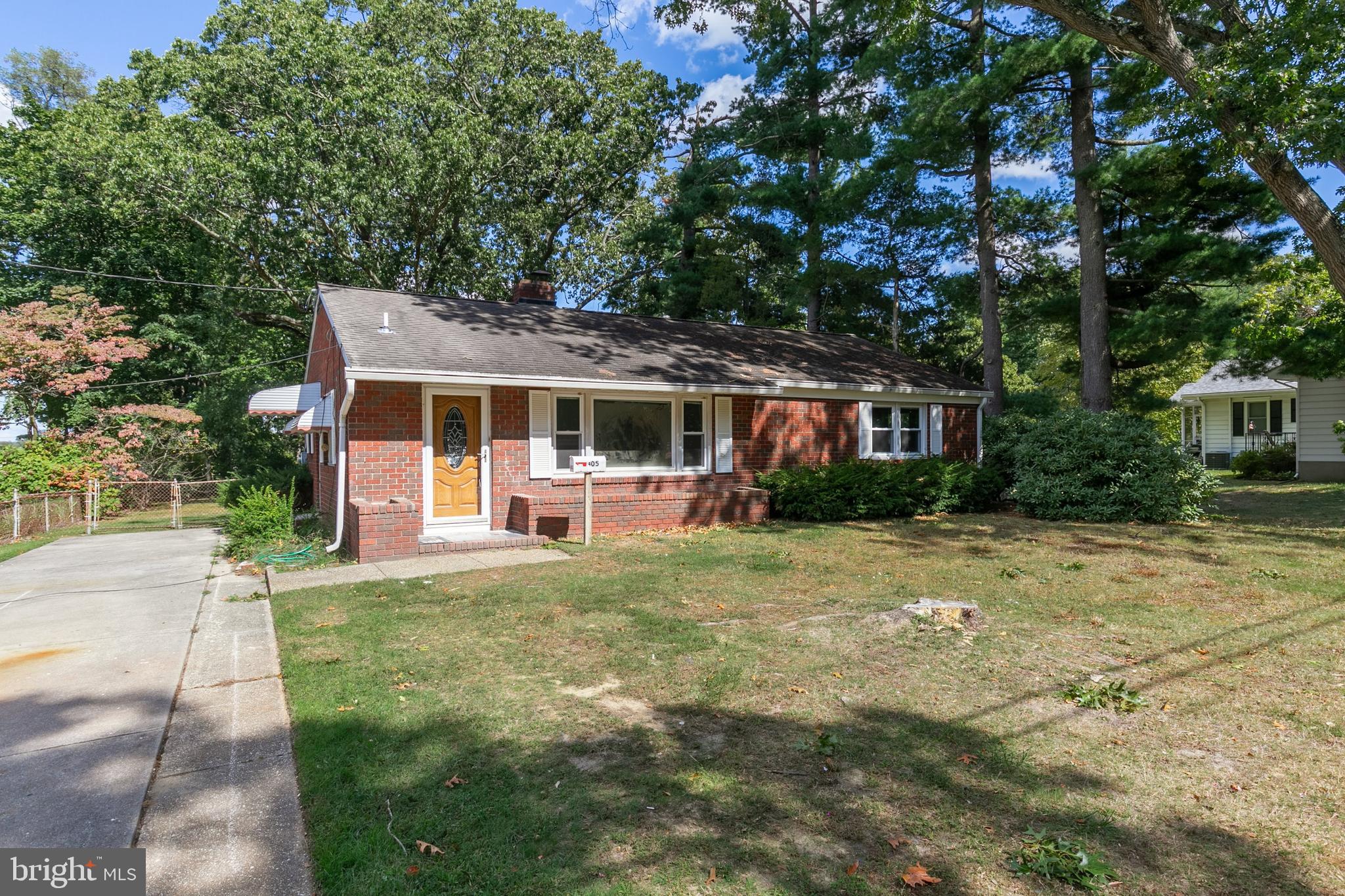 405 Hamilton Road Glassboro, NJ 08028 - Photo 2 of 28 a front view of a house with a garden