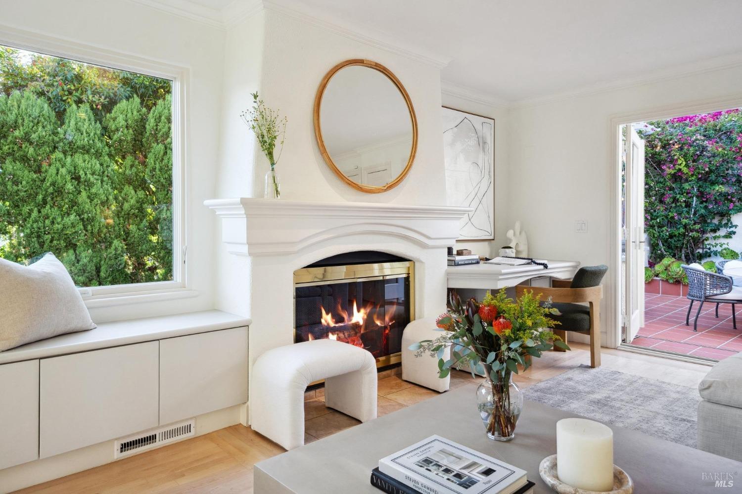 113 Chapel Drive Mill Valley, CA 94941 - Photo 25 of 60 a living room with furniture a potted plant and a fireplace