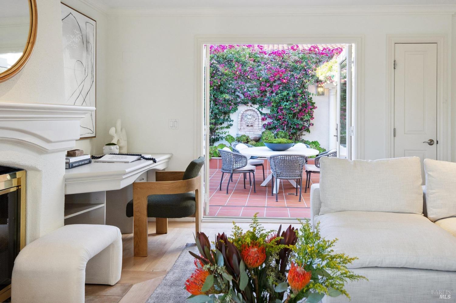 113 Chapel Drive Mill Valley, CA 94941 - Photo 27 of 60 a living room with furniture a flowers and a potted plant