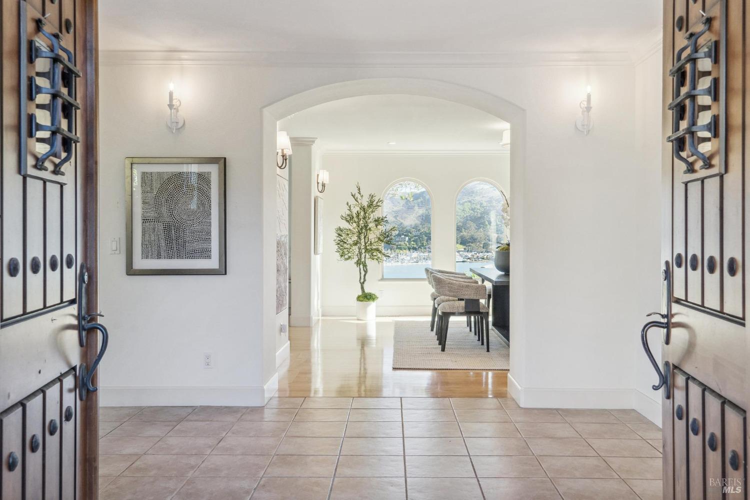 113 Chapel Drive Mill Valley, CA 94941 - Photo 3 of 60 a view of a hallway with wooden floor and a dining room