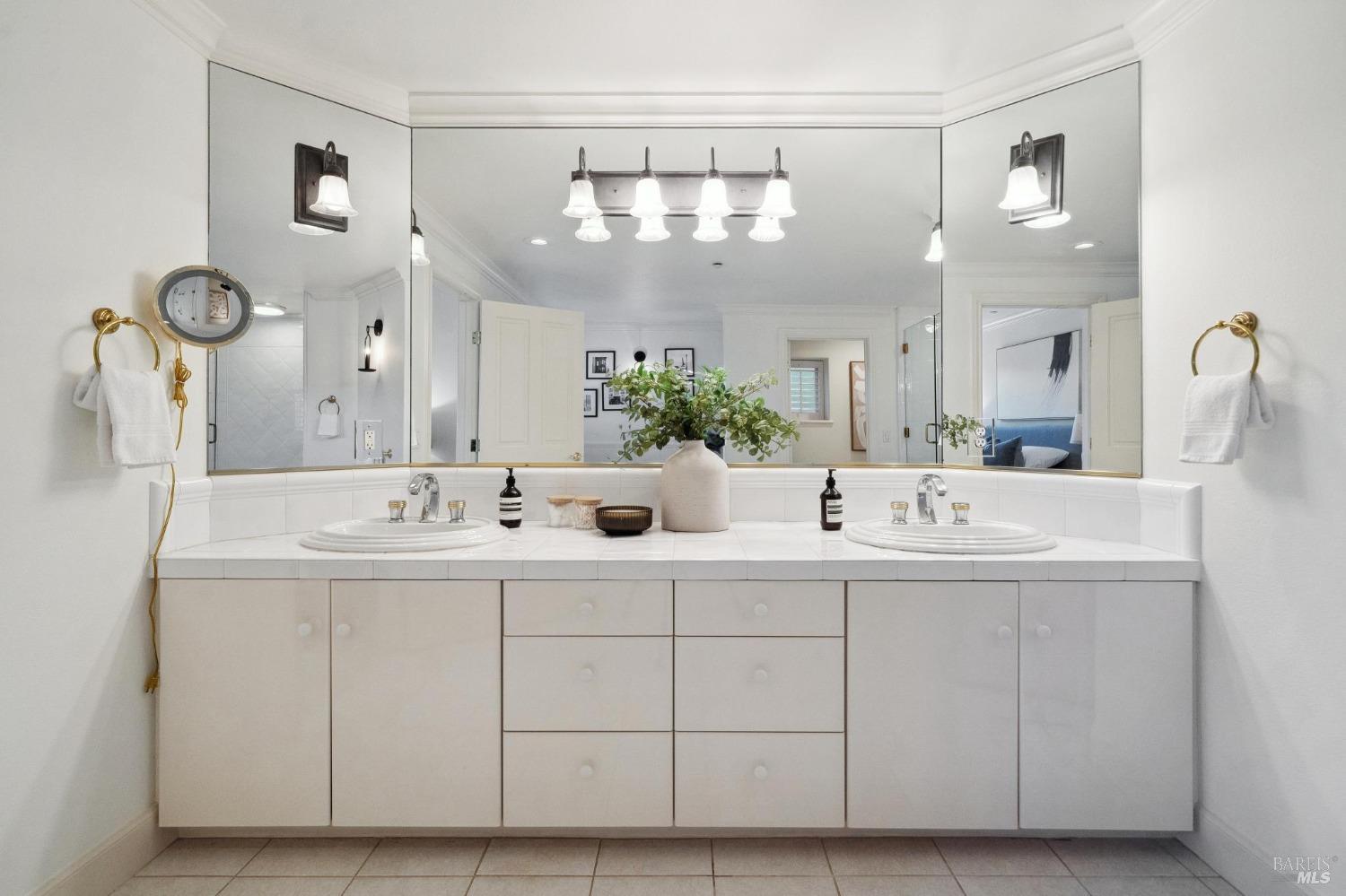 113 Chapel Drive Mill Valley, CA 94941 - Photo 41 of 60 a bathroom with a double vanity sink and a mirror