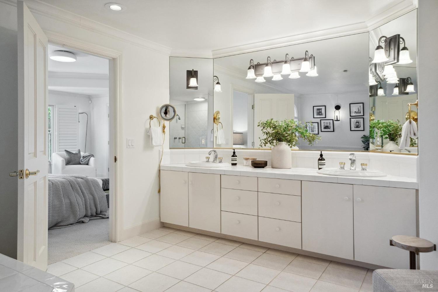 113 Chapel Drive Mill Valley, CA 94941 - Photo 42 of 60 a bathroom with a sink double vanity and a mirror