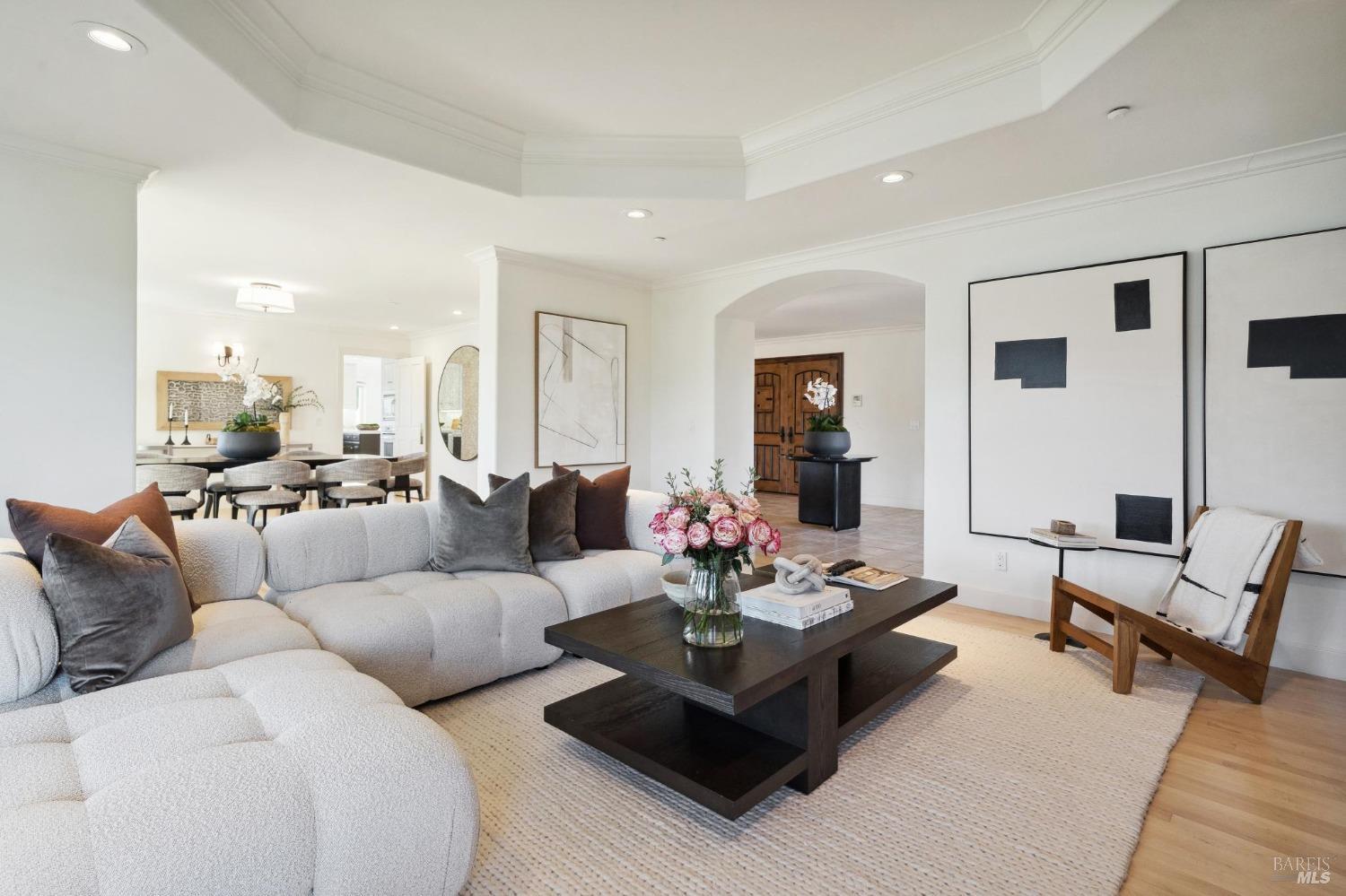 113 Chapel Drive Mill Valley, CA 94941 - Photo 10 of 60 a living room with furniture couches and a dining table with wooden floor