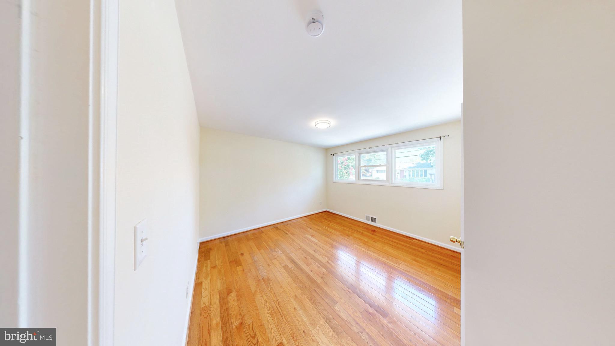 2518 Harmon Road Silver Spring, MD 20902 - Photo 10 of 24 a view of empty room with wooden floor